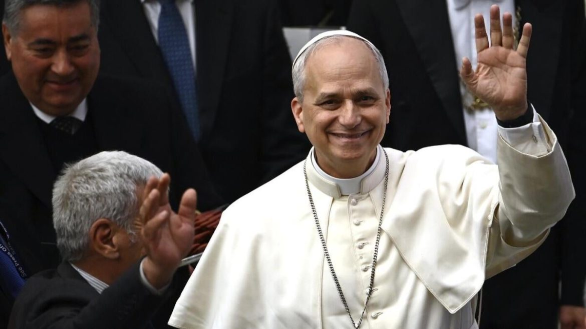 Pope Leo XIV Jokes ‘White Sox or Cubs?’ While Signing Baseball at Vatican AI Event
