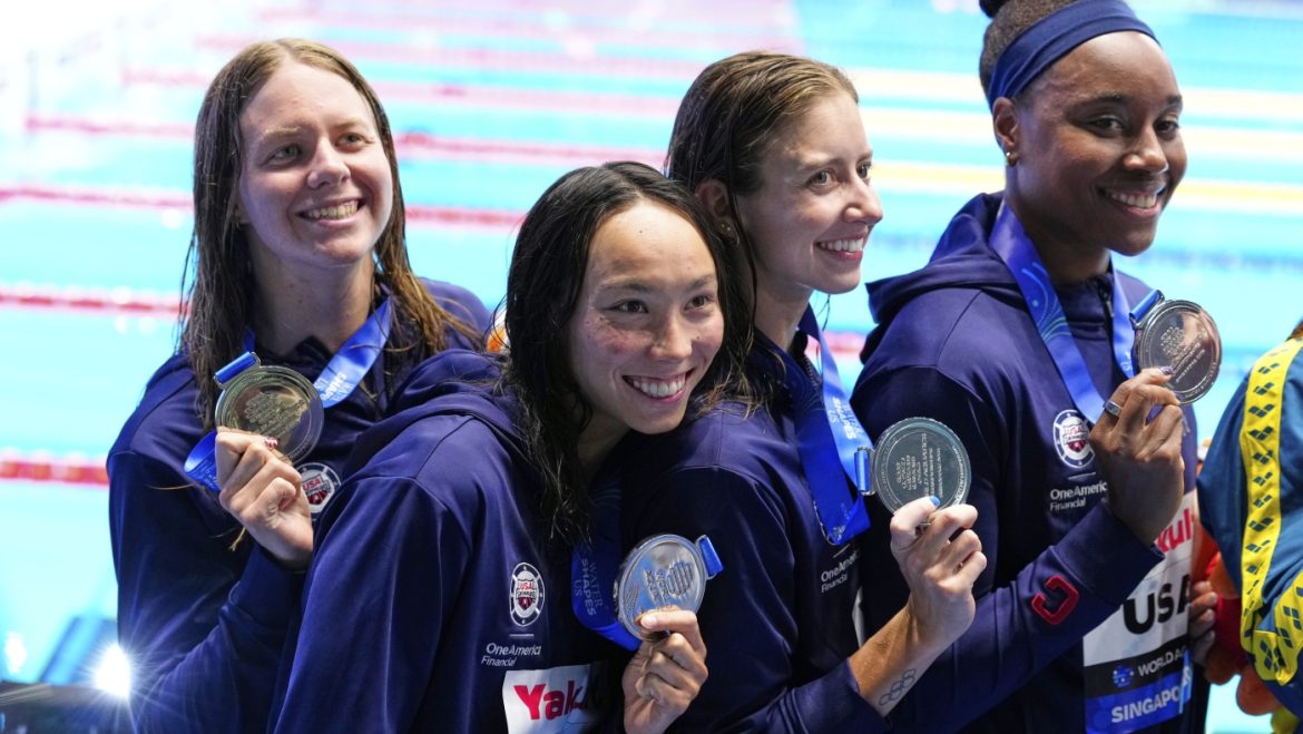 Swimmers Battle Bug at Worlds